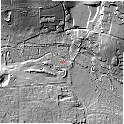 Shaded relief map of the ground around RG142JB, computed from Environment Agency LiDAR. The ground here sits at about 77 m above sea level and falls 28 m across the surrounding 800 m. Surface water reaching this point runs off ground lying to the north-west, 18.7 m higher.