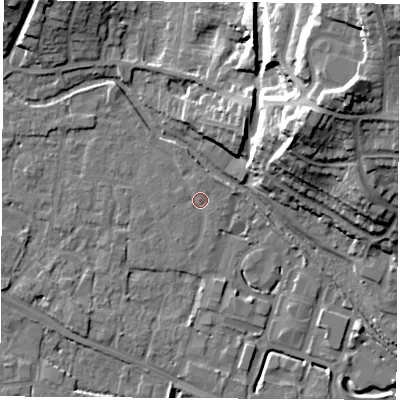 Shaded relief map of the ground around RG142LL, computed from Environment Agency LiDAR. The ground here sits at about 74 m above sea level and falls 30 m across the surrounding 800 m. Surface water reaching this point runs off ground lying to the north-west, 1.8 m higher.