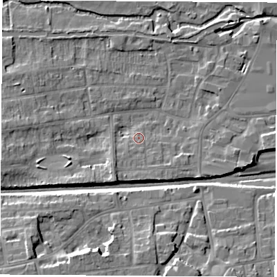Shaded relief map of the ground around RG145PS, computed from Environment Agency LiDAR. The ground here sits at about 77 m above sea level and falls 12 m across the surrounding 800 m. Surface water reaching this point runs off ground lying to the south-west, 3.6 m higher.