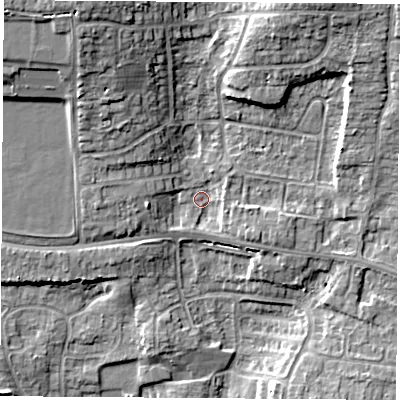 Shaded relief map of the ground around RG183DX, computed from Environment Agency LiDAR. The ground here sits at about 77 m above sea level and falls 14 m across the surrounding 800 m. Surface water reaching this point runs off ground lying to the west, 3.3 m higher.