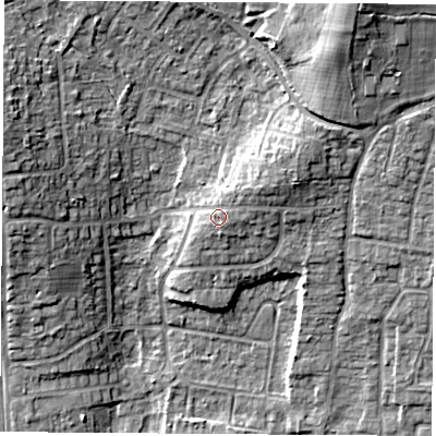 Shaded relief map of the ground around RG183EJ, computed from Environment Agency LiDAR. The ground here sits at about 84 m above sea level and falls 17 m across the surrounding 800 m. Surface water reaching this point runs off ground lying to the north-east, 3.0 m higher.