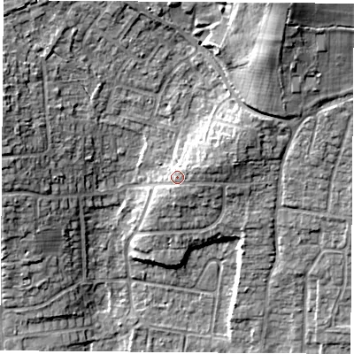 Shaded relief map of the ground around RG183EL, computed from Environment Agency LiDAR. The ground here sits at about 84 m above sea level and falls 18 m across the surrounding 800 m. Surface water reaching this point runs off ground lying to the east-north-east, 2.5 m higher.