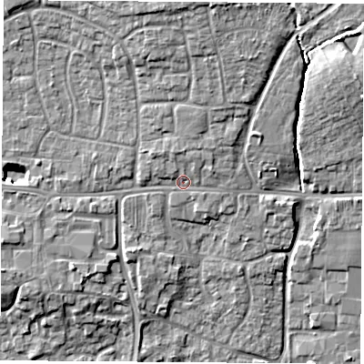 Shaded relief map of the ground around RG184QN, computed from Environment Agency LiDAR. The ground here sits at about 77 m above sea level and falls 14 m across the surrounding 800 m. Surface water reaching this point runs off ground lying to the north-north-east, 5.2 m higher.