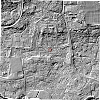 Shaded relief map of the ground around RG194QT, computed from Environment Agency LiDAR. The ground here sits at about 69 m above sea level and falls 9 m across the surrounding 800 m. Surface water reaching this point runs off ground lying to the north-north-west, 3.1 m higher.