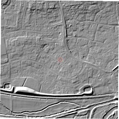 Shaded relief map of the ground around RG194RG, computed from Environment Agency LiDAR. The ground here sits at about 69 m above sea level and falls 8 m across the surrounding 800 m. The ground contributing surface water to this point lies to the east-south-east.