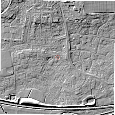 Shaded relief map of the ground around RG194RS, computed from Environment Agency LiDAR. The ground here sits at about 69 m above sea level and falls 8 m across the surrounding 800 m. Surface water reaching this point runs off ground lying to the north-north-west, 6.1 m higher.