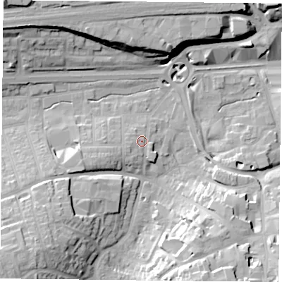 Shaded relief map of the ground around RG217TA, computed from Environment Agency LiDAR. The ground here sits at about 84 m above sea level and falls 23 m across the surrounding 800 m. Surface water reaching this point runs off ground lying to the south-west, 2.2 m higher.