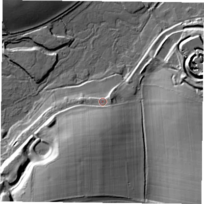 Shaded relief map of the ground around RG247HB, computed from Environment Agency LiDAR. The ground here sits at about 79 m above sea level and falls 28 m across the surrounding 800 m. Surface water reaching this point runs off ground lying to the south, 13.9 m higher.