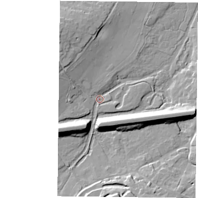 Shaded relief map of the ground around RG248AE, computed from Environment Agency LiDAR. The ground here sits at about 72 m above sea level and falls 16 m across the surrounding 800 m. Surface water reaching this point runs off ground lying to the south-west, 14.0 m higher.