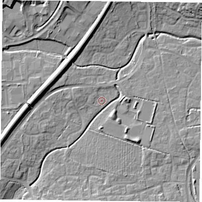 Shaded relief map of the ground around RG248TU, computed from Environment Agency LiDAR. The ground here sits at about 69 m above sea level and falls 13 m across the surrounding 800 m. Surface water reaching this point runs off ground lying to the south-west, 7.6 m higher.
