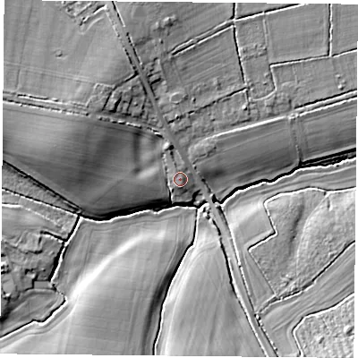 Shaded relief map of the ground around RG265QR, computed from Environment Agency LiDAR. The ground here sits at about 76 m above sea level and falls 13 m across the surrounding 800 m. Surface water reaching this point runs off ground lying to the west-north-west, 6.8 m higher.