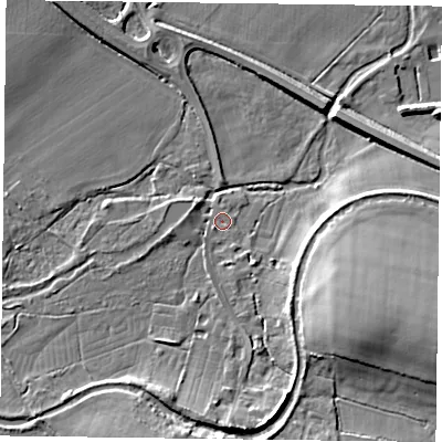 Shaded relief map of the ground around RG291ET, computed from Environment Agency LiDAR. The ground here sits at about 74 m above sea level and falls 13 m across the surrounding 800 m. Surface water reaching this point runs off ground lying to the south, 6.8 m higher.