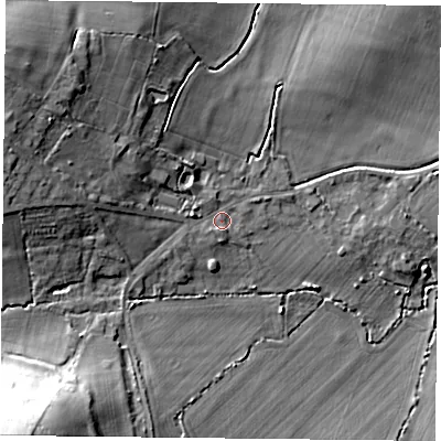 Shaded relief map of the ground around RG303TH, computed from Environment Agency LiDAR. The ground here sits at about 52 m above sea level and falls 34 m across the surrounding 800 m. Surface water reaching this point runs off ground lying to the west-north-west, 9.4 m higher.