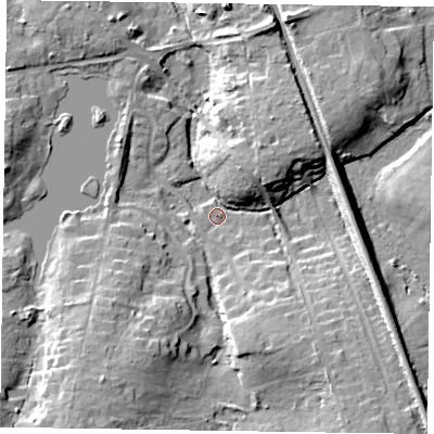 Shaded relief map of the ground around RG403QS, computed from Environment Agency LiDAR. The ground here sits at about 62 m above sea level and falls 13 m across the surrounding 800 m. Surface water reaching this point runs off ground lying to the south-east, 10.5 m higher.