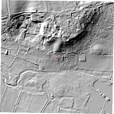 Shaded relief map of the ground around RG404RP, computed from Environment Agency LiDAR. The ground here sits at about 53 m above sea level and falls 17 m across the surrounding 800 m. Surface water reaching this point runs off ground lying to the north, 6.0 m higher.