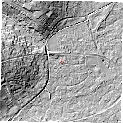 Shaded relief map of the ground around RG63AW, computed from Environment Agency LiDAR. The ground here sits at about 42 m above sea level and falls 16 m across the surrounding 800 m. Surface water reaching this point runs off ground lying to the north-west, 2.6 m higher.
