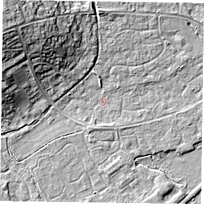 Shaded relief map of the ground around RG63UA, computed from Environment Agency LiDAR. The ground here sits at about 40 m above sea level and falls 18 m across the surrounding 800 m. Surface water reaching this point runs off ground lying to the north-west, 16.8 m higher.