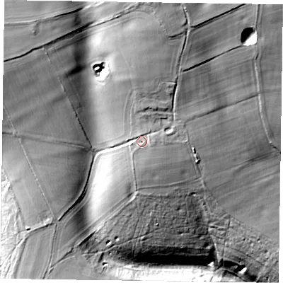 Shaded relief map of the ground around RG96LT, computed from Environment Agency LiDAR. The ground here sits at about 121 m above sea level and falls 46 m across the surrounding 800 m. Surface water reaching this point runs off ground lying to the north, 16.4 m higher.