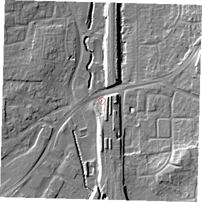 Shaded relief map of the ground around RH101LY, computed from Environment Agency LiDAR. The ground here sits at about 70 m above sea level and falls 12 m across the surrounding 800 m. Surface water reaching this point runs off ground lying to the south, 7.7 m higher.