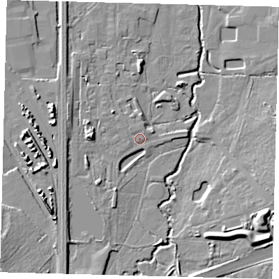 Shaded relief map of the ground around RH102AQ, computed from Environment Agency LiDAR. The ground here sits at about 65 m above sea level and falls 14 m across the surrounding 800 m. Surface water reaching this point runs off ground lying to the west, 5.6 m higher.