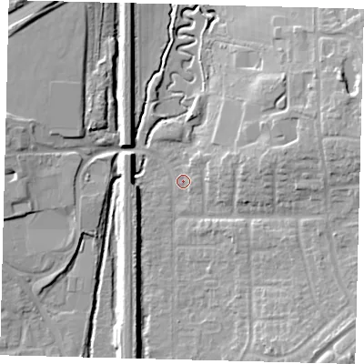 Shaded relief map of the ground around RH103BQ, computed from Environment Agency LiDAR. The ground here sits at about 67 m above sea level and falls 14 m across the surrounding 800 m. Surface water reaching this point runs off ground lying to the east, 10.9 m higher.