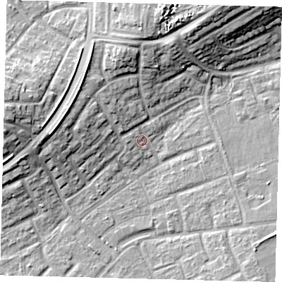 Shaded relief map of the ground around RH105DQ, computed from Environment Agency LiDAR. The ground here sits at about 77 m above sea level and falls 16 m across the surrounding 800 m. Surface water reaching this point runs off ground lying to the north-west, 5.4 m higher.
