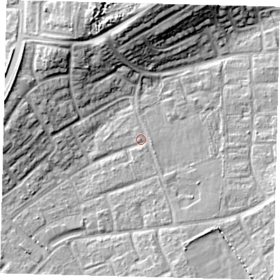 Shaded relief map of the ground around RH105DW, computed from Environment Agency LiDAR. The ground here sits at about 76 m above sea level and falls 15 m across the surrounding 800 m. Surface water reaching this point runs off ground lying to the south, 0.9 m higher.