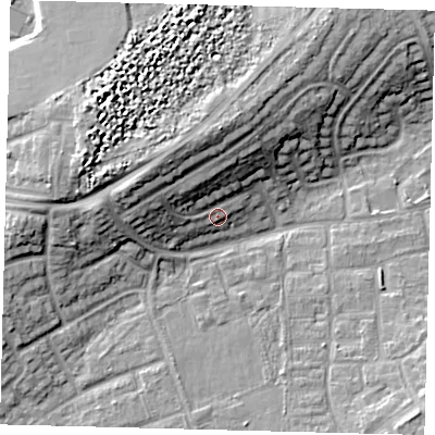 Shaded relief map of the ground around RH106HX, computed from Environment Agency LiDAR. The ground here sits at about 77 m above sea level and falls 15 m across the surrounding 800 m. Surface water reaching this point runs off ground lying to the north, 9.1 m higher.
