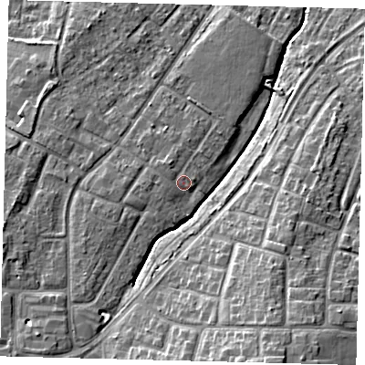 Shaded relief map of the ground around RH108DQ, computed from Environment Agency LiDAR. The ground here sits at about 69 m above sea level and falls 14 m across the surrounding 800 m. Surface water reaching this point runs off ground lying to the west, 1.5 m higher.