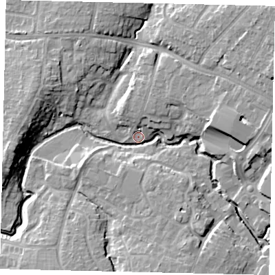 Shaded relief map of the ground around RH121TX, computed from Environment Agency LiDAR. The ground here sits at about 35 m above sea level and falls 11 m across the surrounding 800 m. Surface water reaching this point runs off ground lying to the east, 8.6 m higher.