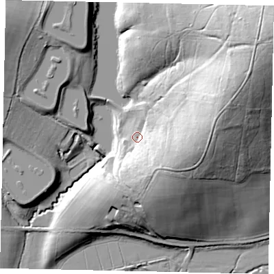 Shaded relief map of the ground around RH130QZ, computed from Environment Agency LiDAR. The ground here sits at about 33 m above sea level and falls 43 m across the surrounding 800 m. Surface water reaching this point runs off ground lying to the south-east, 15.6 m higher.