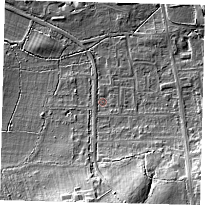 Shaded relief map of the ground around RH15HQ, computed from Environment Agency LiDAR. The ground here sits at about 59 m above sea level and falls 15 m across the surrounding 800 m. Surface water reaching this point runs off ground lying to the south-south-east, 12.2 m higher.