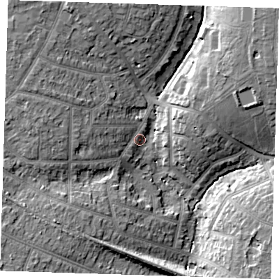 Shaded relief map of the ground around RM112AW, computed from Environment Agency LiDAR. The ground here sits at about 24 m above sea level and falls 14 m across the surrounding 800 m. Surface water reaching this point runs off ground lying to the west, 5.7 m higher.