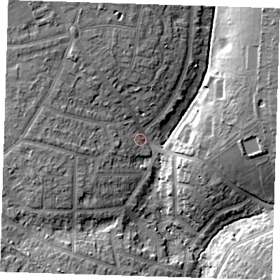 Shaded relief map of the ground around RM112BY, computed from Environment Agency LiDAR. The ground here sits at about 25 m above sea level and falls 15 m across the surrounding 800 m. Surface water reaching this point runs off ground lying to the north-north-west, 9.3 m higher.