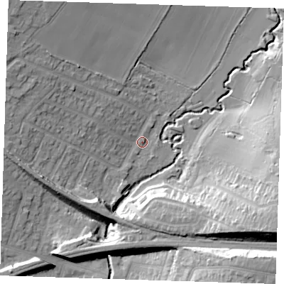 Shaded relief map of the ground around RM113PX, computed from Environment Agency LiDAR. The ground here sits at about 12 m above sea level and falls 23 m across the surrounding 800 m. Surface water reaching this point runs off ground lying to the south-east, 22.9 m higher.