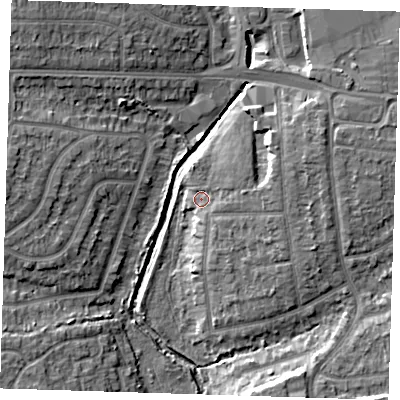 Shaded relief map of the ground around RM124DU, computed from Environment Agency LiDAR. The ground here sits at about 9 m above sea level and falls 9 m across the surrounding 800 m. Surface water reaching this point runs off ground lying to the east-north-east, 4.1 m higher.