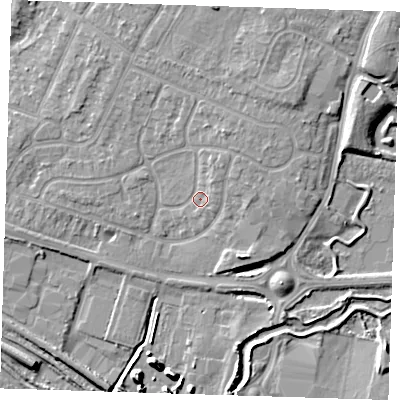 Shaded relief map of the ground around RM138JJ, computed from Environment Agency LiDAR. The ground here sits at about 5 m above sea level and falls 9 m across the surrounding 800 m. Surface water reaching this point runs off ground lying to the north-north-east, 2.9 m higher.