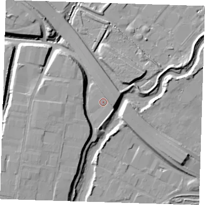 Shaded relief map of the ground around RM138LE, computed from Environment Agency LiDAR. The ground here sits at about 5 m above sea level and falls 12 m across the surrounding 800 m. Surface water reaching this point runs off ground lying to the west, 7.3 m higher.