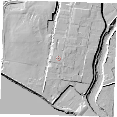 Shaded relief map of the ground around RM138UH, computed from Environment Agency LiDAR. The ground here sits at about 11 m above sea level and falls 12 m across the surrounding 800 m. Surface water reaching this point runs off ground lying to the north-north-east, 0.9 m higher.