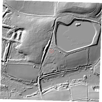Shaded relief map of the ground around RM139EJ, computed from Environment Agency LiDAR. The ground here sits at about 12 m above sea level and falls 18 m across the surrounding 800 m. Surface water reaching this point runs off ground lying to the north-north-east, 9.8 m higher.