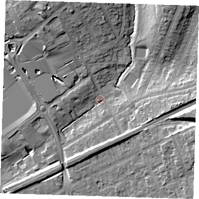 Shaded relief map of the ground around RM13QR, computed from Environment Agency LiDAR. The ground here sits at about 18 m above sea level and falls 18 m across the surrounding 800 m. Surface water reaching this point runs off ground lying to the north-east, 13.1 m higher.