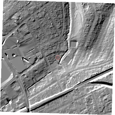 Shaded relief map of the ground around RM13QX, computed from Environment Agency LiDAR. The ground here sits at about 18 m above sea level and falls 18 m across the surrounding 800 m. Surface water reaching this point runs off ground lying to the north-east, 13.9 m higher.