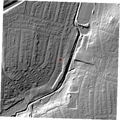Shaded relief map of the ground around RM142NS, computed from Environment Agency LiDAR. The ground here sits at about 11 m above sea level and falls 21 m across the surrounding 800 m. Surface water reaching this point runs off ground lying to the north-west, 8.2 m higher.