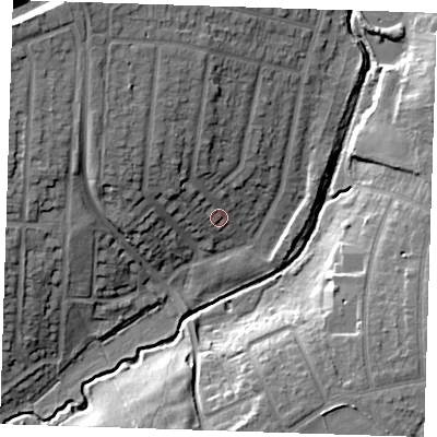 Shaded relief map of the ground around RM142PP, computed from Environment Agency LiDAR. The ground here sits at about 12 m above sea level and falls 22 m across the surrounding 800 m. Surface water reaching this point runs off ground lying to the north-north-west, 10.4 m higher.