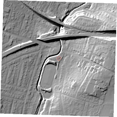 Shaded relief map of the ground around RM142QD, computed from Environment Agency LiDAR. The ground here sits at about 11 m above sea level and falls 24 m across the surrounding 800 m. Surface water reaching this point runs off ground lying to the north-east, 0.8 m higher.