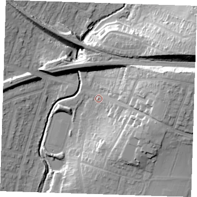 Shaded relief map of the ground around RM142QT, computed from Environment Agency LiDAR. The ground here sits at about 13 m above sea level and falls 25 m across the surrounding 800 m. Surface water reaching this point runs off ground lying to the east, 18.6 m higher.