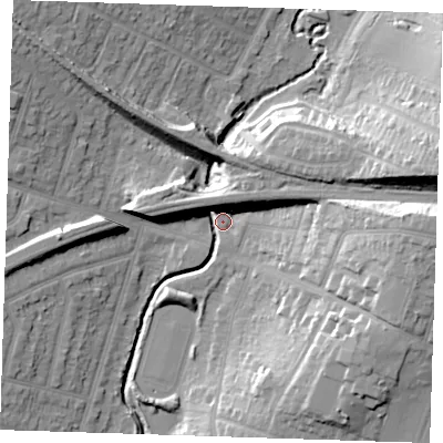 Shaded relief map of the ground around RM142QW, computed from Environment Agency LiDAR. The ground here sits at about 11 m above sea level and falls 24 m across the surrounding 800 m. Surface water reaching this point runs off ground lying to the east, 22.4 m higher.