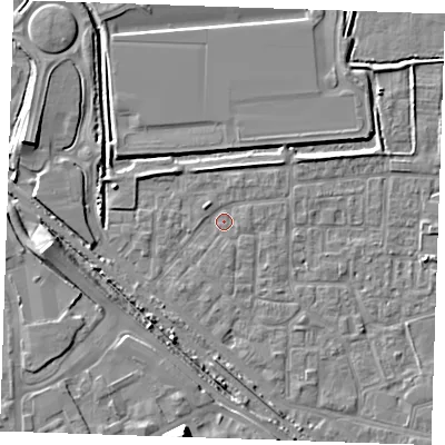 Shaded relief map of the ground around RM187AH, computed from Environment Agency LiDAR. The ground here sits at about 0 m above sea level and falls 12 m across the surrounding 800 m. Surface water reaching this point runs off ground lying to the south, 11.7 m higher.