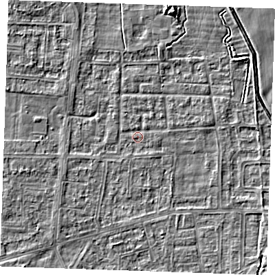 Shaded relief map of the ground around RM188JE, computed from Environment Agency LiDAR. The ground here sits at about 0 m above sea level and falls 5 m across the surrounding 800 m. Surface water reaching this point runs off ground lying to the south-east, 2.6 m higher.
