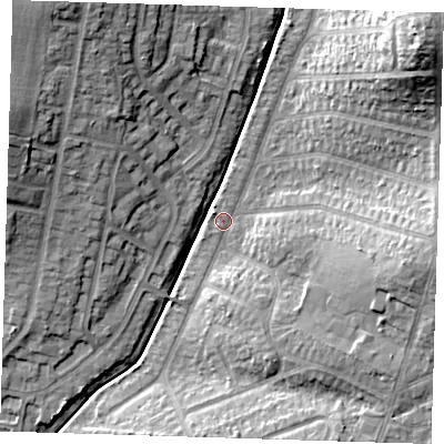 Shaded relief map of the ground around RM52UU, computed from Environment Agency LiDAR. The ground here sits at about 28 m above sea level and falls 27 m across the surrounding 800 m. Surface water reaching this point runs off ground lying to the north-east, 23.1 m higher.